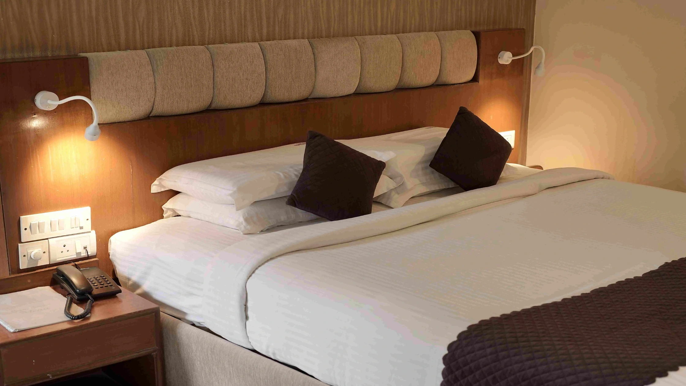 AC hotel room in Mysore with comfortable modern interiors